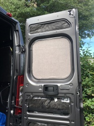 Window cover fitted in door